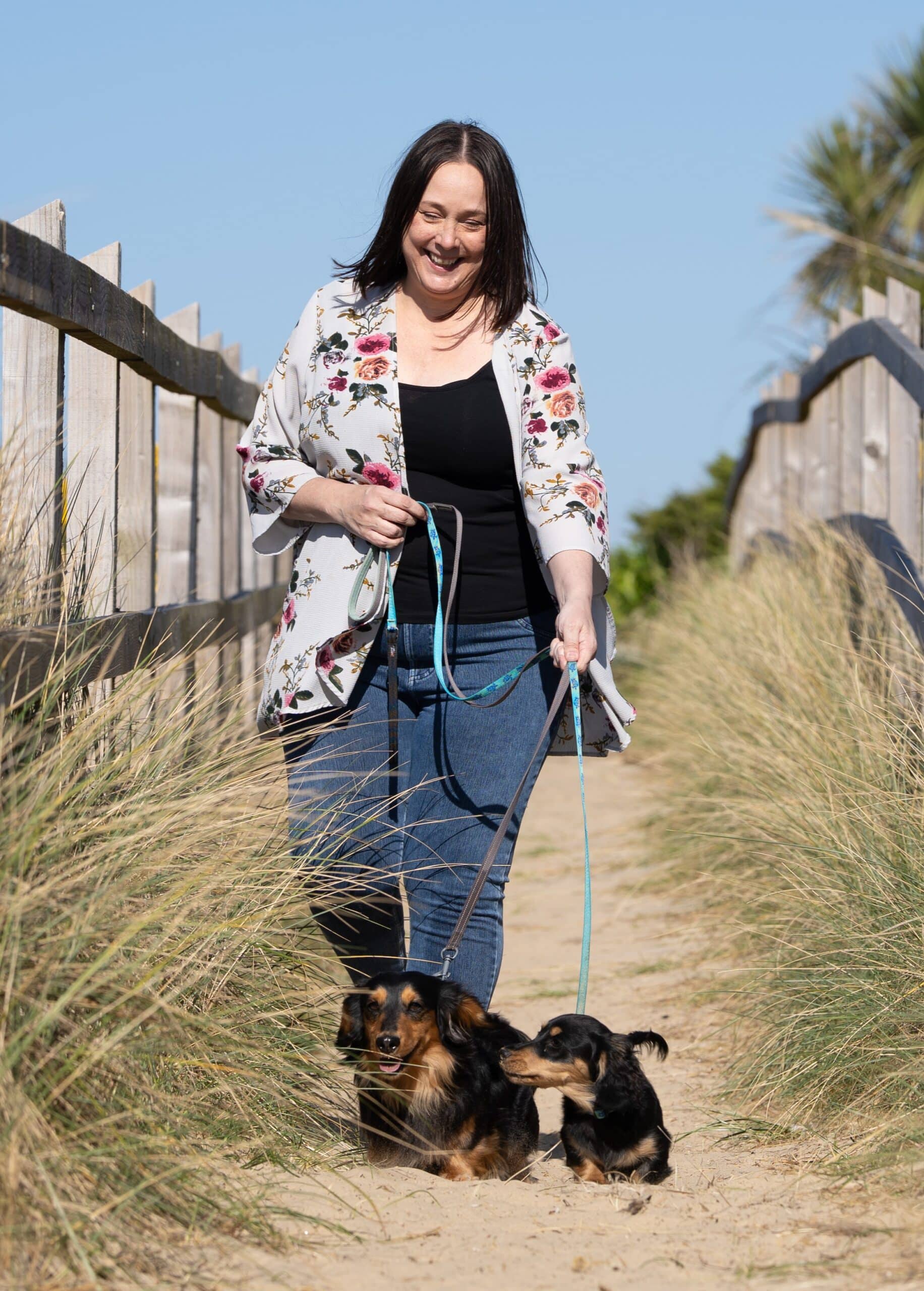Sharon-121 - Portrait Sharon Talbot, founder of SD Virtual Solutions, walking her dachshunds Reggie and Percy on the beach